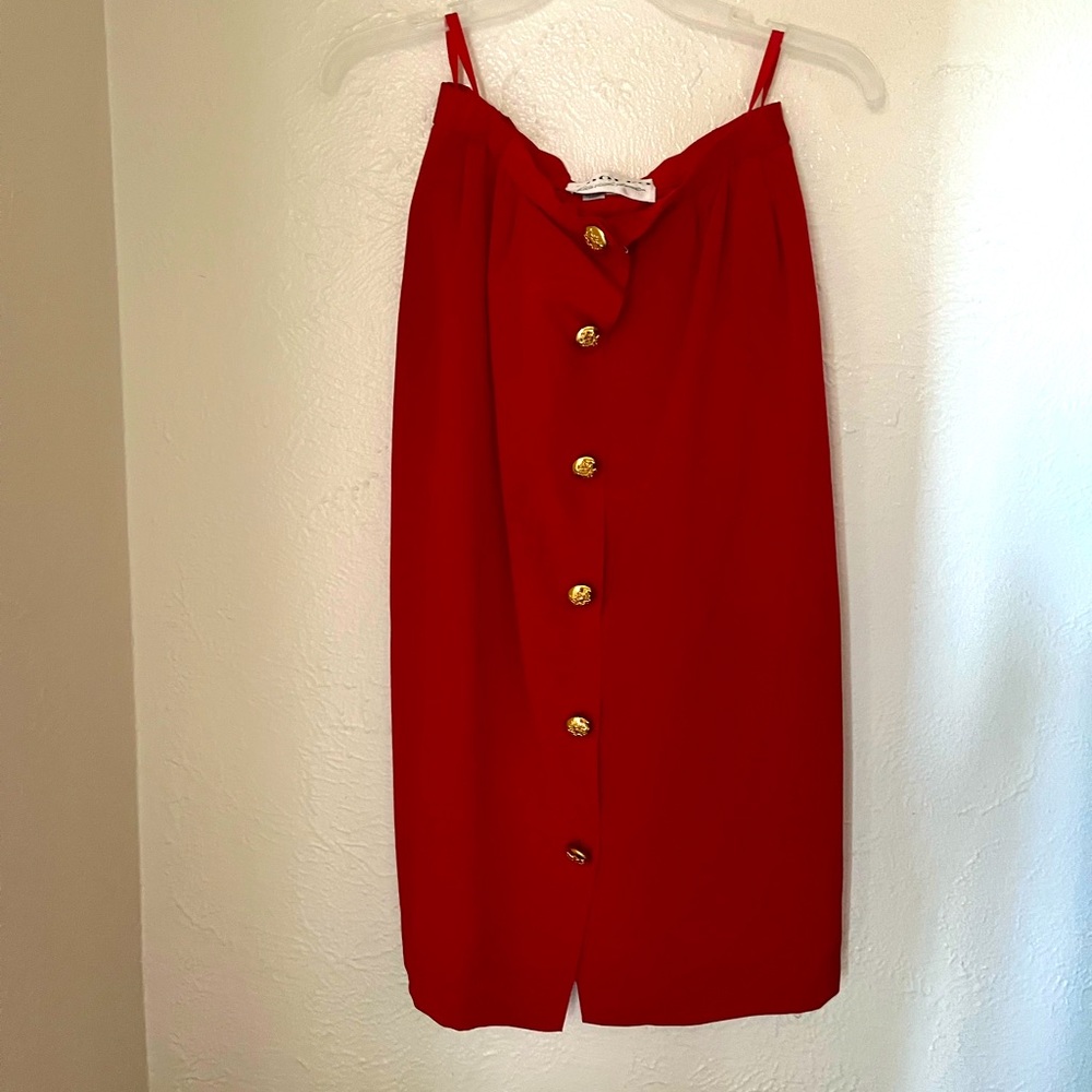 Vintage red silk skirt with gold buttons. Mid calf length.